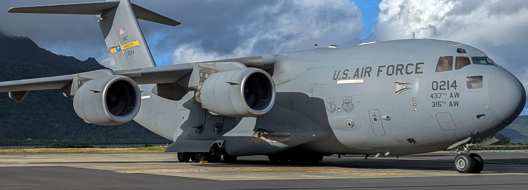 A photo of a C-17 Globemaster III parked at Pago Pago International Airport.