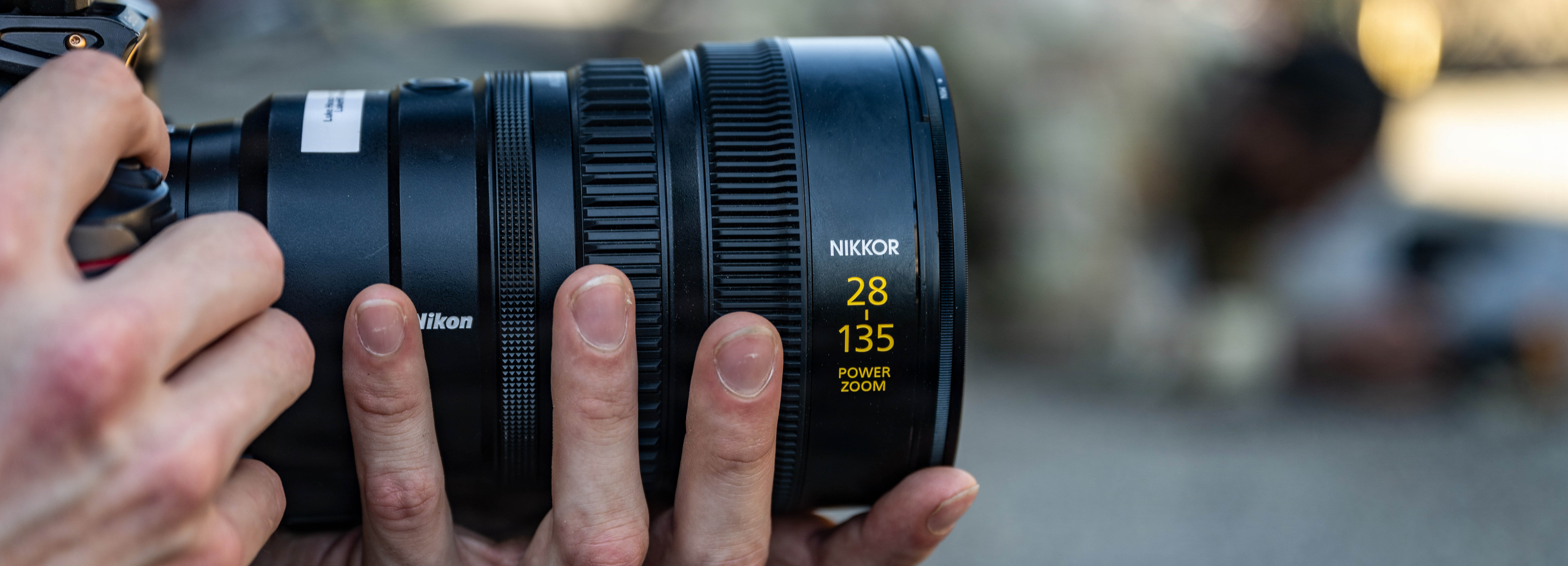 Hands hold a camera. 